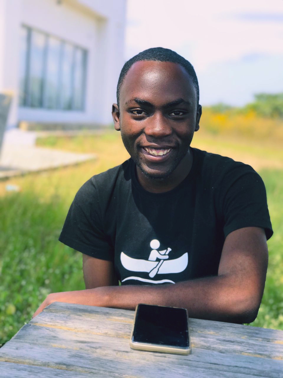 Stanley Chanda Mubanga smiling outdoors